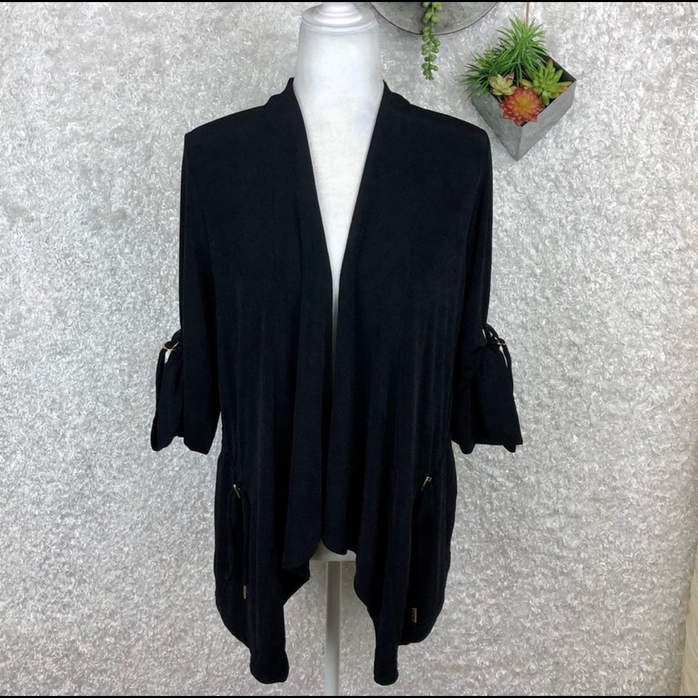 Chico’s Traveler Roll-Tab Jacket black.